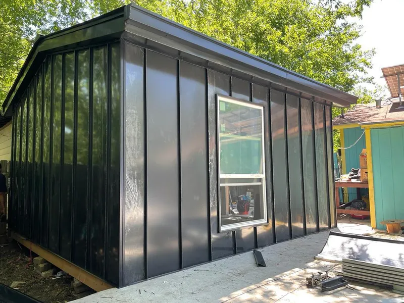 Black standing seam metal wall panels for Roof Inspection in Tolland