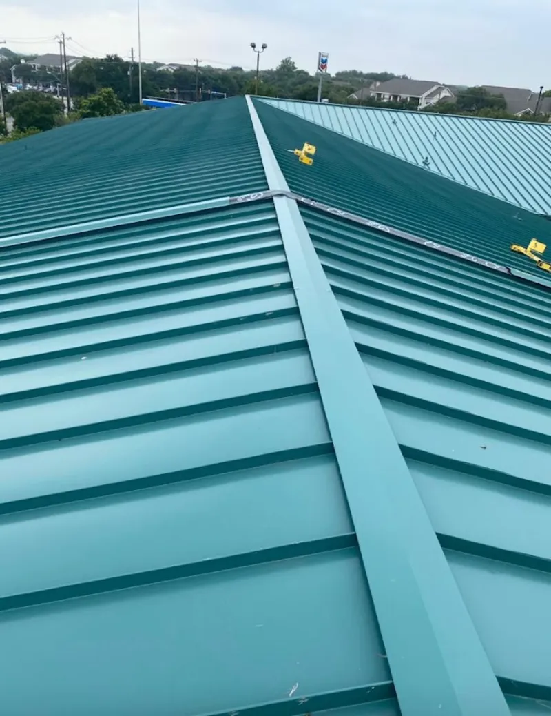 Green commercial metal roof ridge and valley for Metal Roof Repair in Tolland