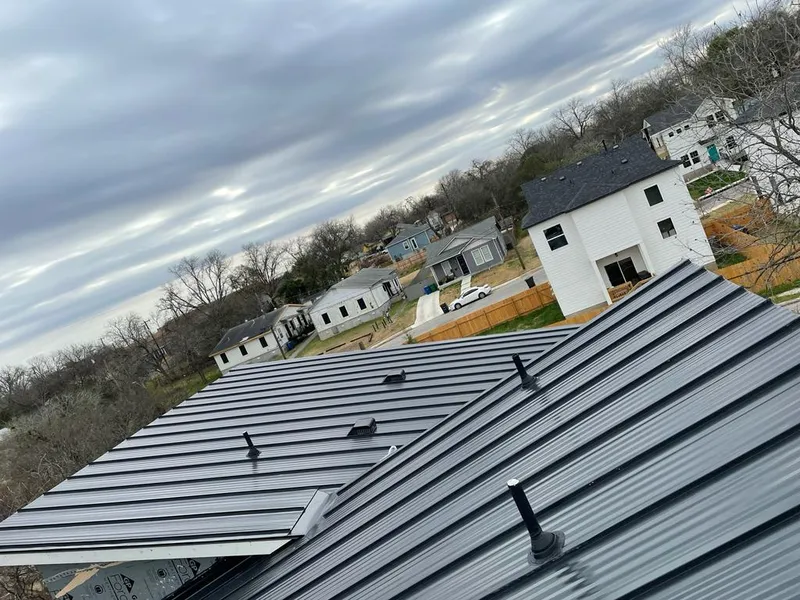 Standing seam metal roof panels with vents for Skylight Repair in Tolland